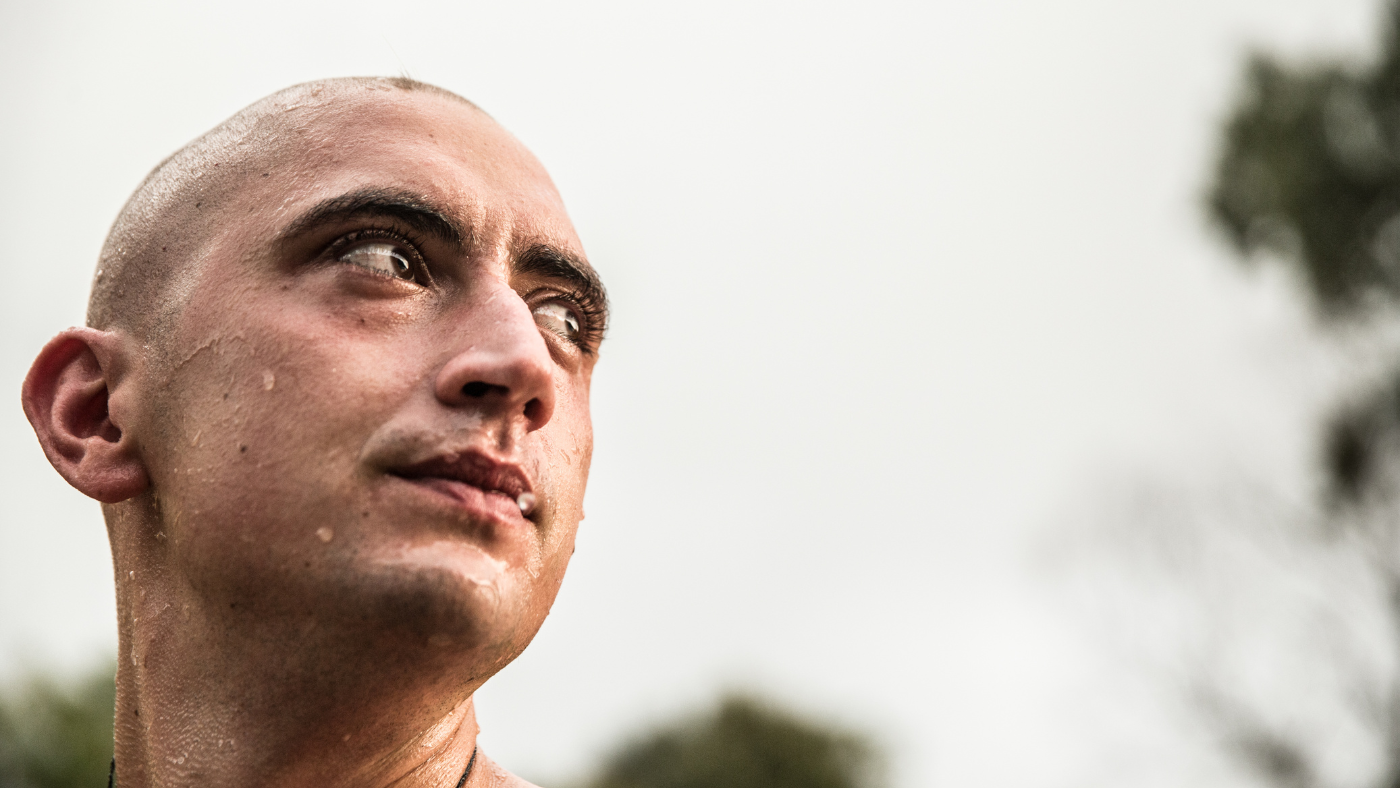 Bald guy sweating
