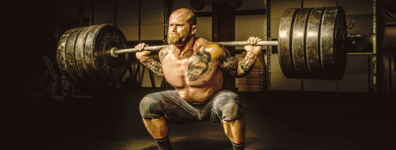 Bald Man lifting weights