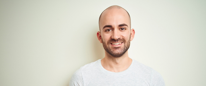 Bald black guy in shirt