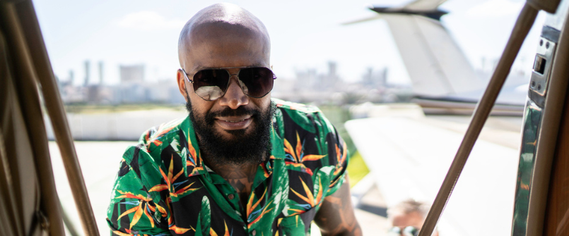 Black person with bald hair