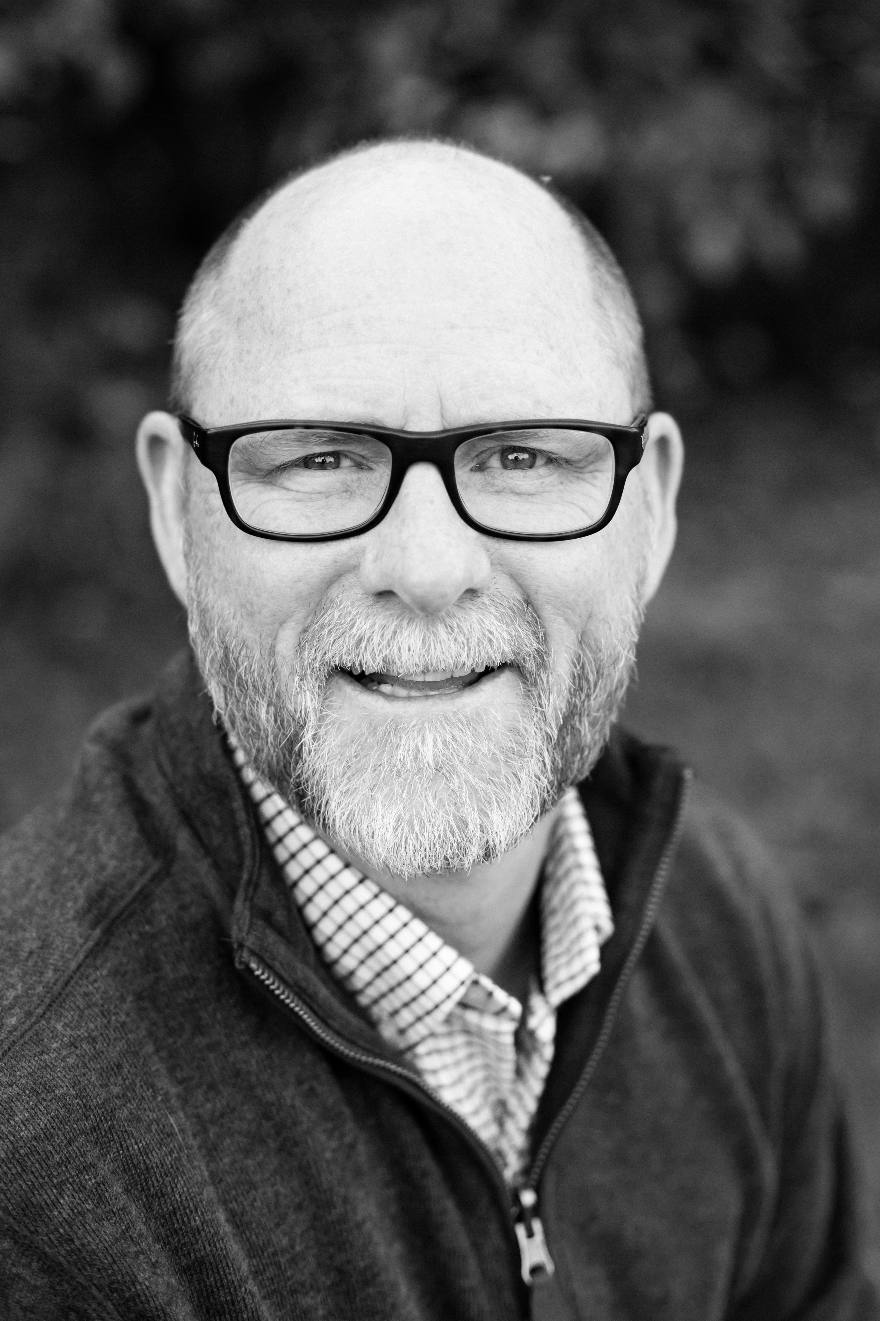 bald man in glasses